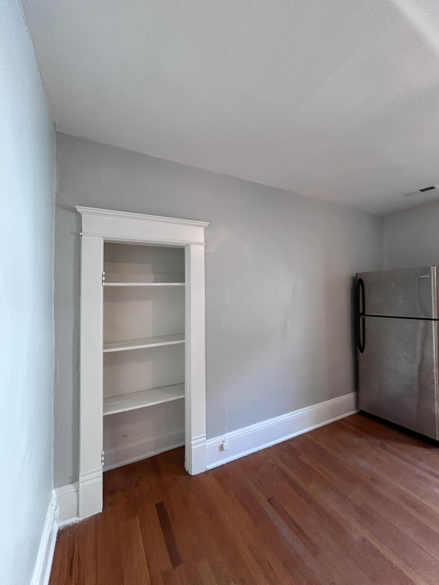 429 Albemarle Avenue Southwest, Unit UPPR Roanoke, VA 24016 - Photo 14 of 24 a view of an empty room with a closet