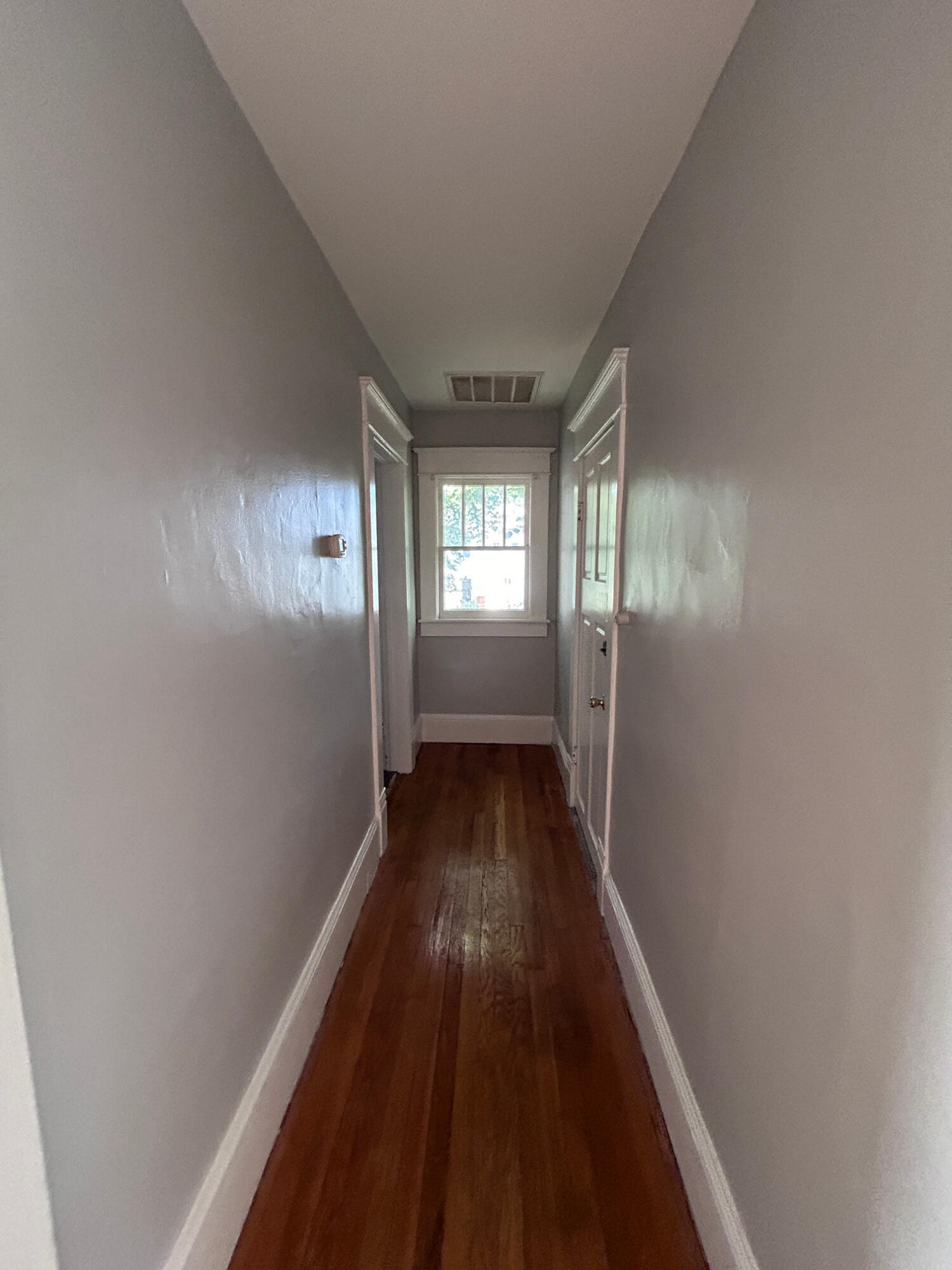 429 Albemarle Avenue Southwest, Unit UPPR Roanoke, VA 24016 - Photo 16 of 24 a view of hallway with wooden floor