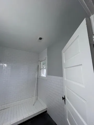 a bathroom with a bathtub