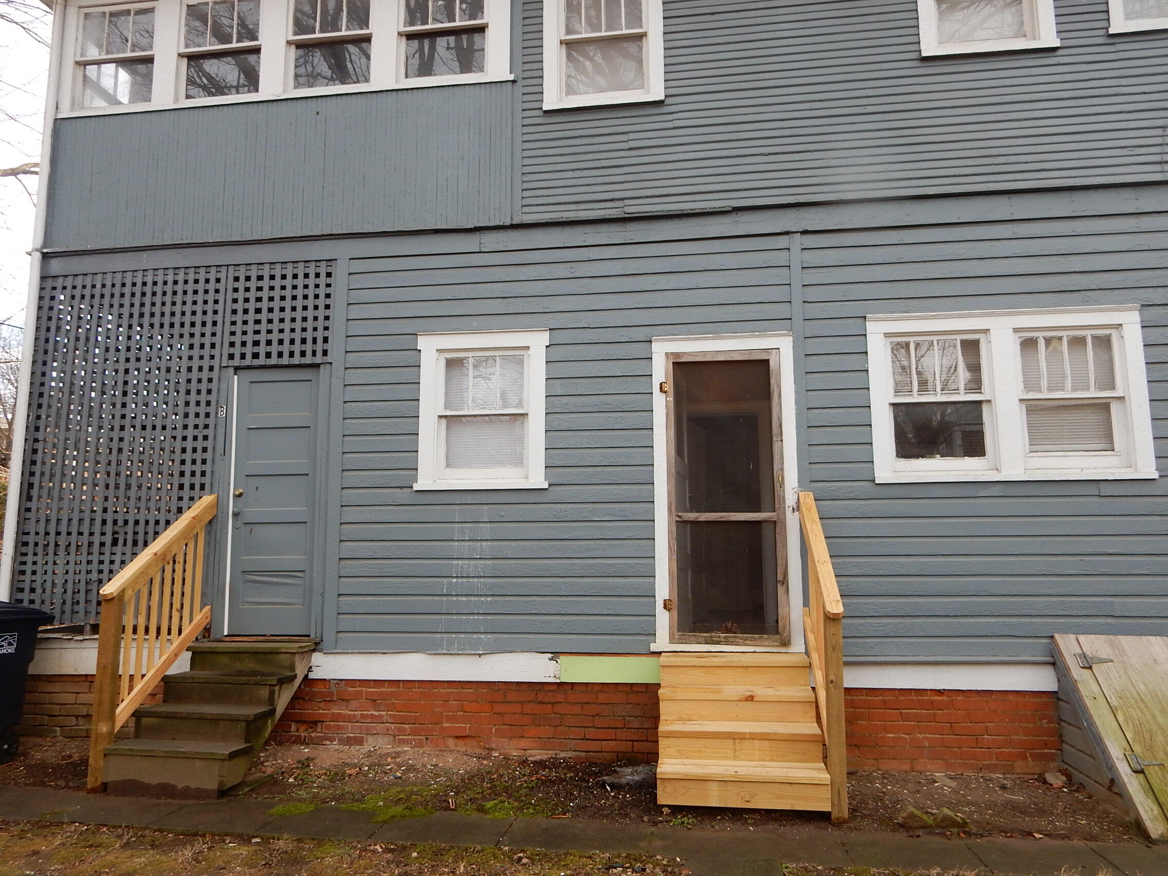 429 Albemarle Avenue Southwest, Unit UPPR Roanoke, VA 24016 - Photo 22 of 24 a view of a house with wooden stairs