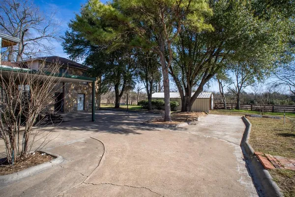 a view of backyard with trees