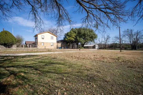 a view of a yard with a sink