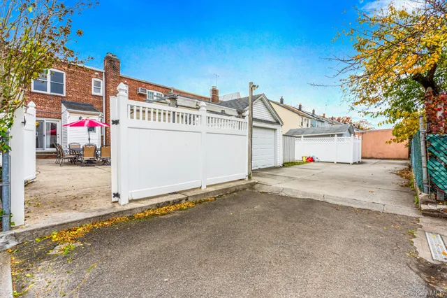 a view of a house with a street