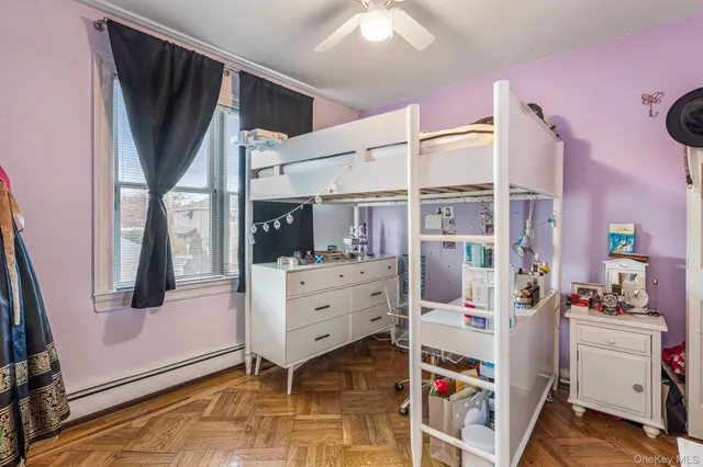 a room with a window and storage space