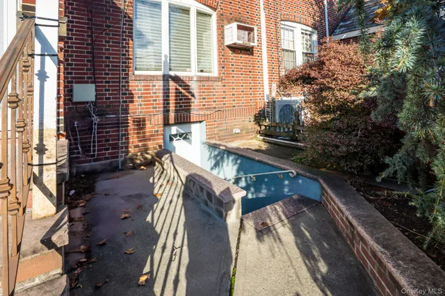 a view of balcony with two chairs and a table