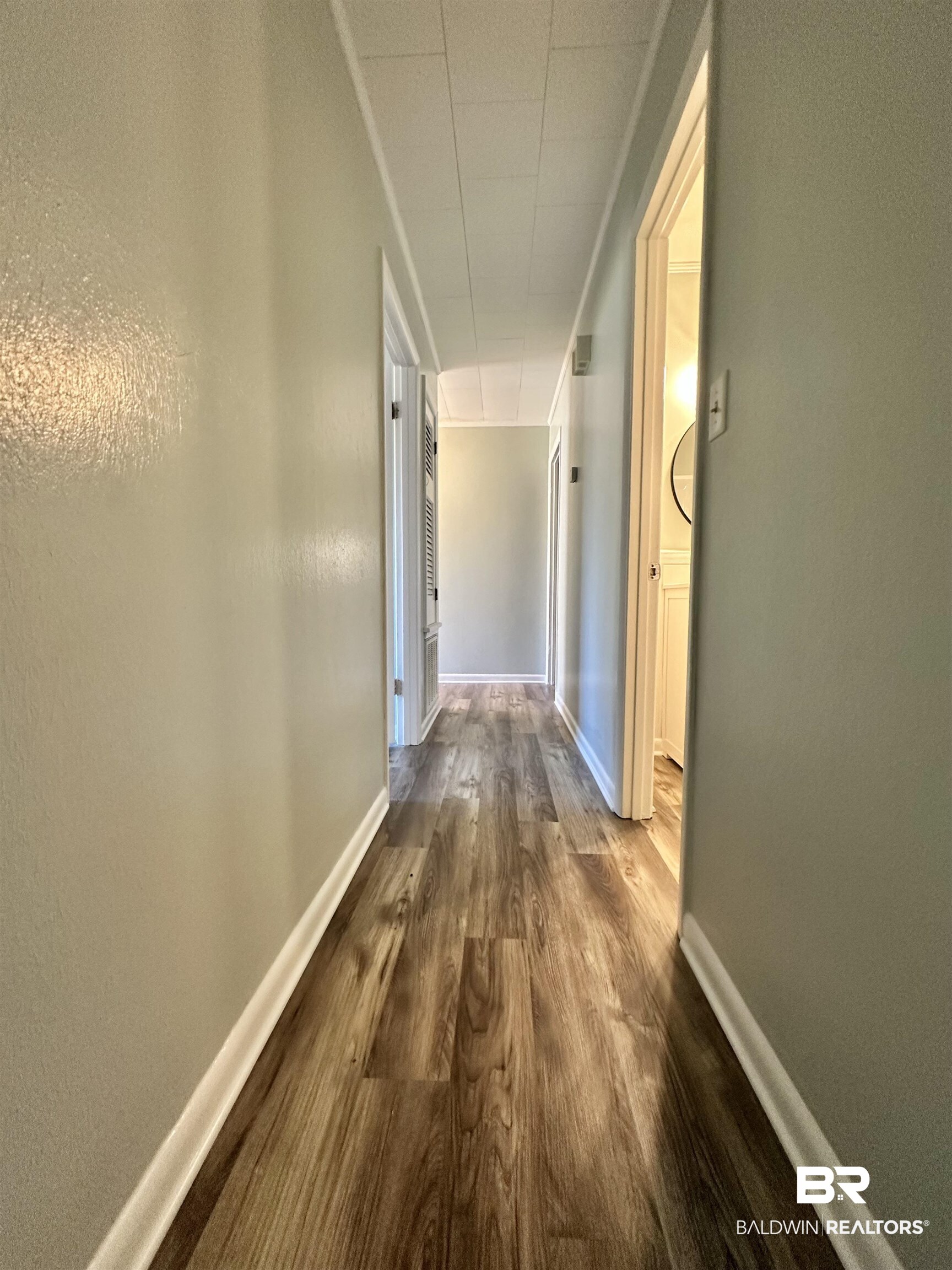 103 Avalon Street Brewton, AL 36426 - Photo 10 of 14 Corridor featuring hardwood / wood-style flooring