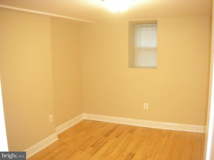 4732 Benning Road Southeast, Unit 102 Washington, DC 20019 - Photo 12 of 28 a view of an empty room