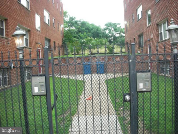 4732 Benning Road Southeast, Unit 102 Washington, DC 20019 - Photo 23 of 28 a view of a backyard from a garden