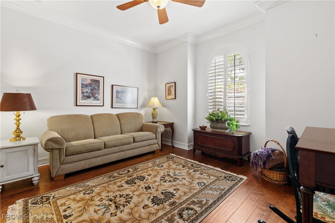 15035 Balmoral Loop Fort Myers, FL 33919 - Photo 6 of 39 a living room with furniture and a potted plant