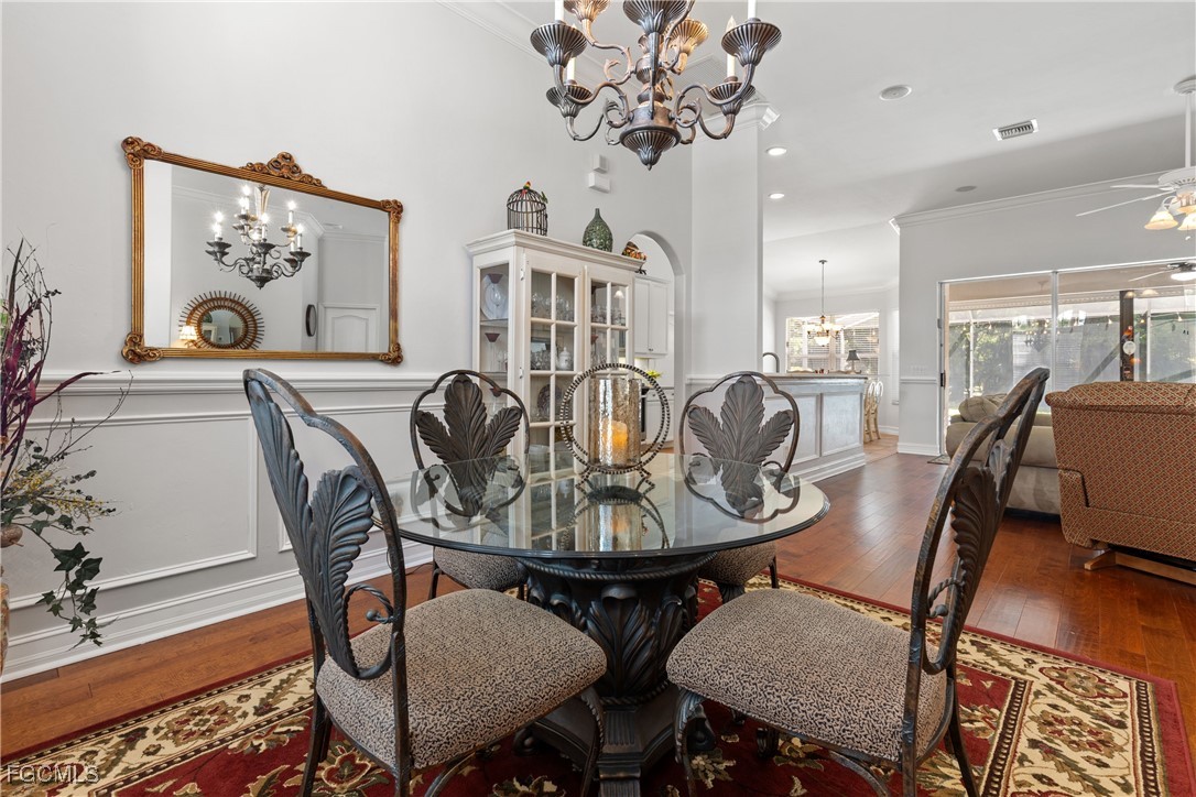 15035 Balmoral Loop Fort Myers, FL 33919 - Photo 8 of 39 a view of a dining room with furniture