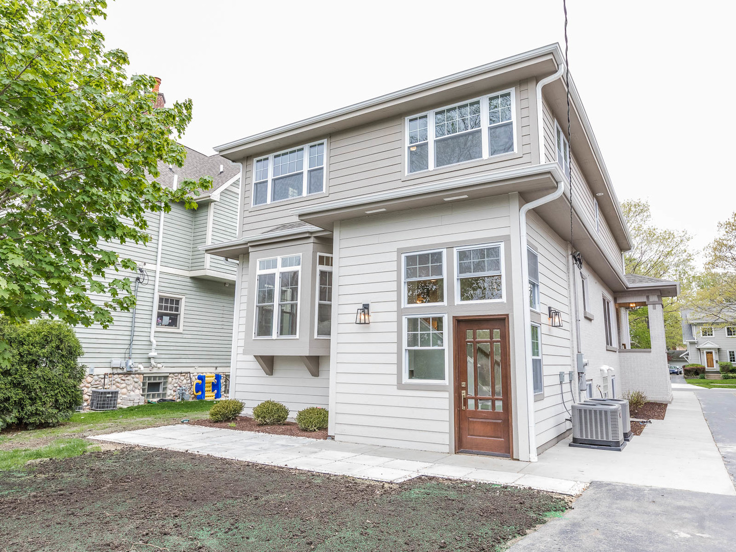 271 Lawton Road Riverside, IL 60546 - Photo 29 of 29 a front view of a house with a yard and garage