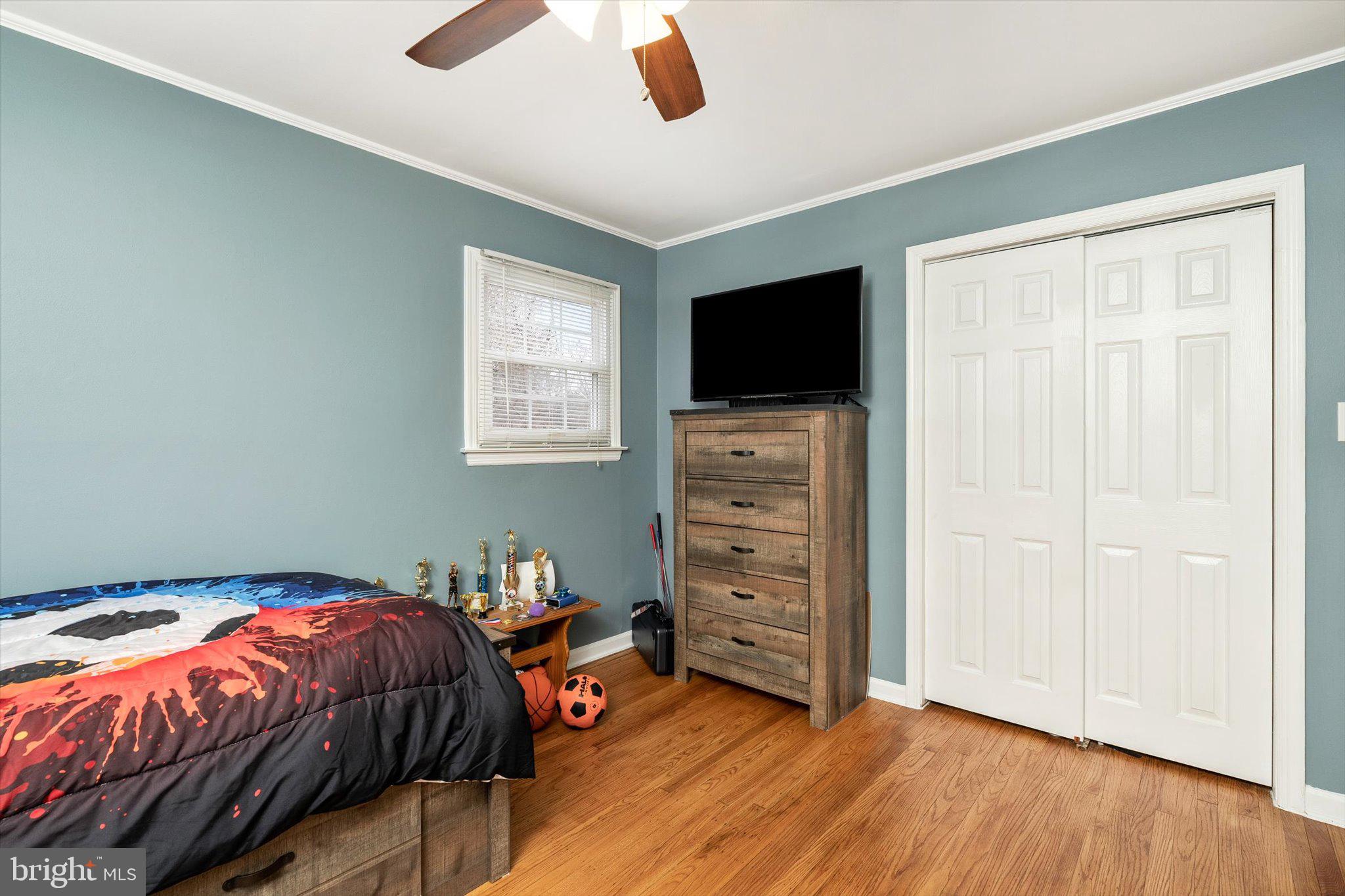 4 Imperial Drive Hamilton, NJ 08690 - Photo 20 of 36 a bedroom with a bed and a flat screen tv