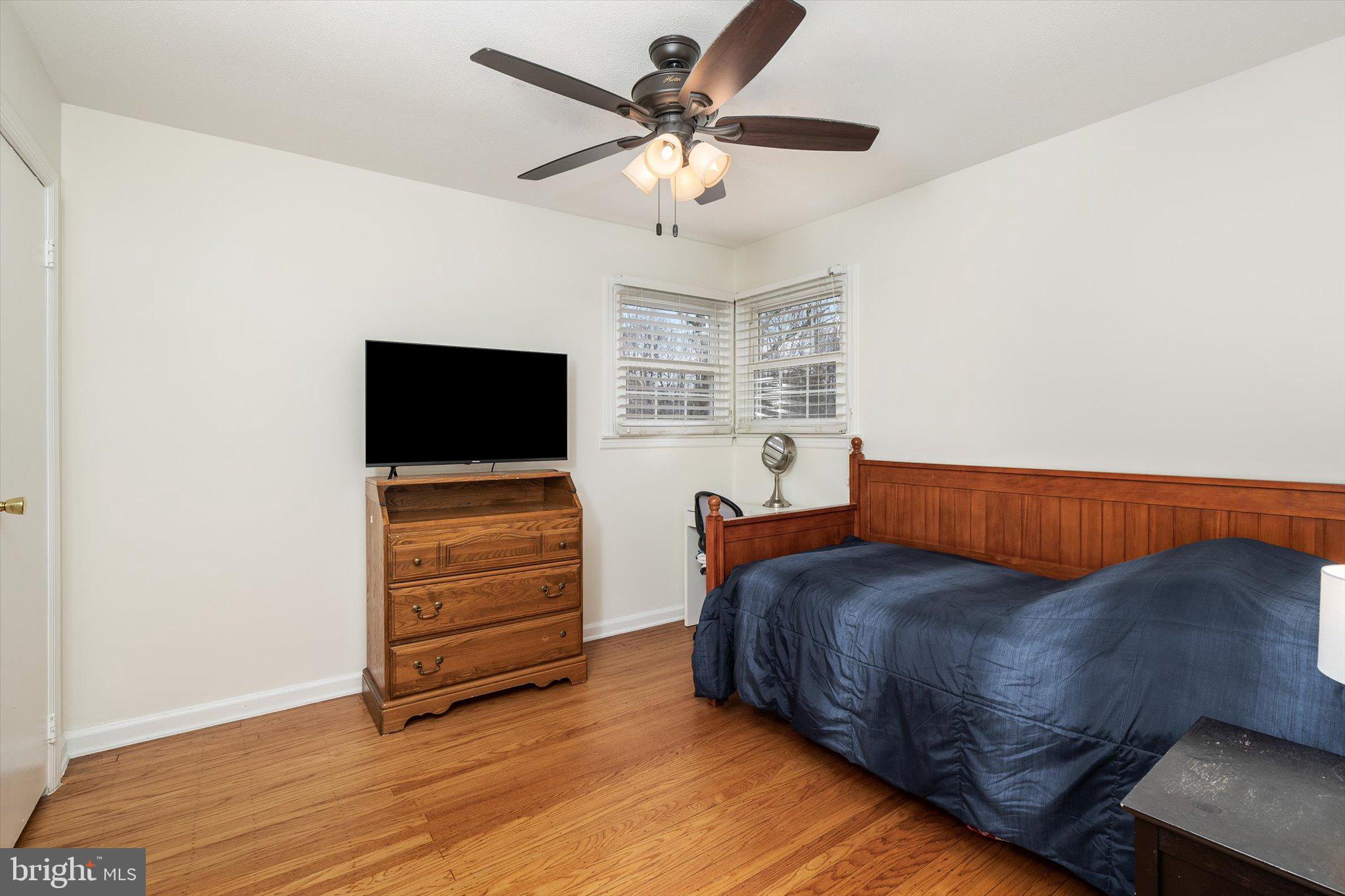 4 Imperial Drive Hamilton, NJ 08690 - Photo 21 of 36 a living room with furniture and a flat screen tv