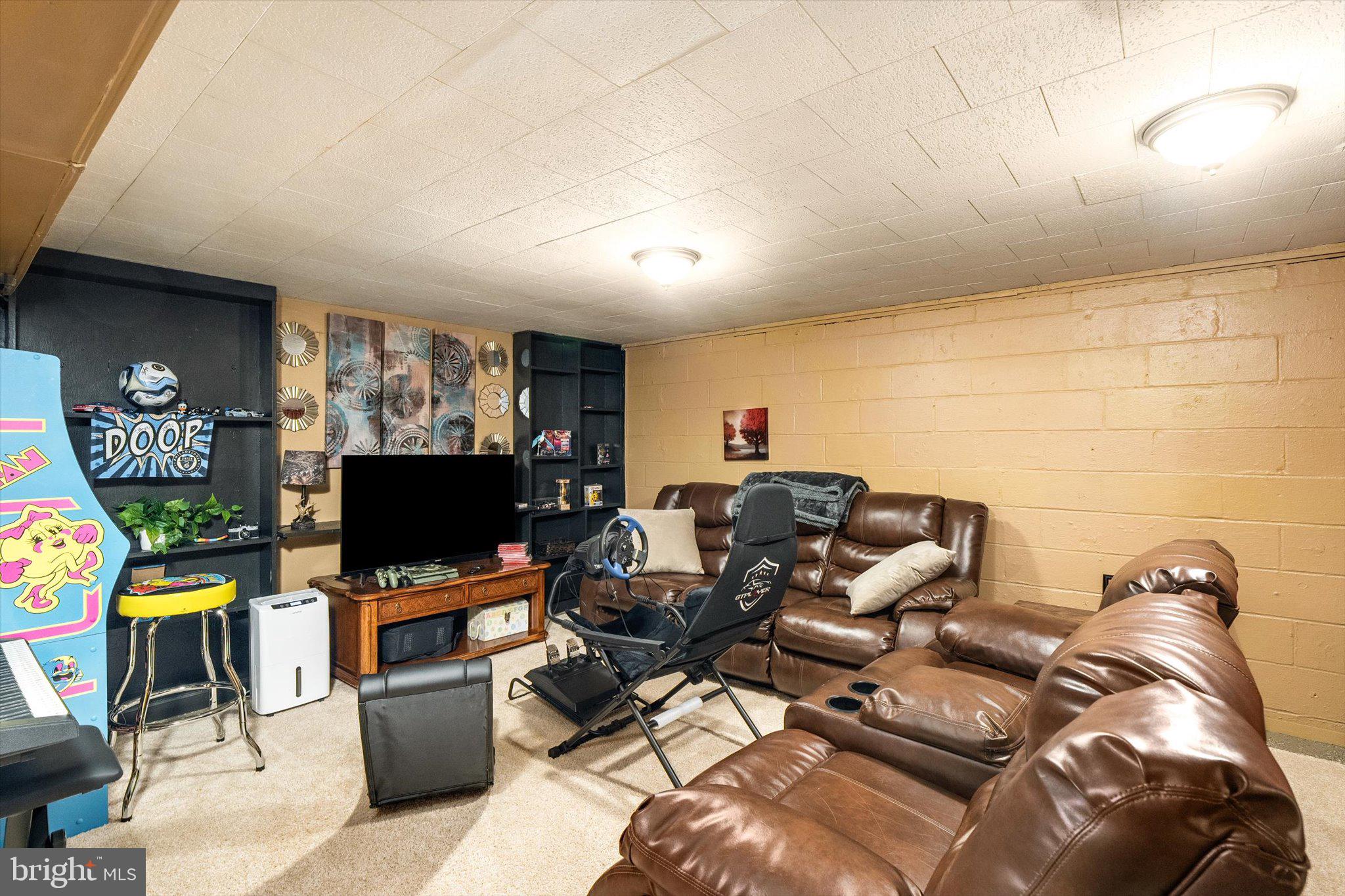 4 Imperial Drive Hamilton, NJ 08690 - Photo 25 of 36 a living room with furniture and a flat screen tv