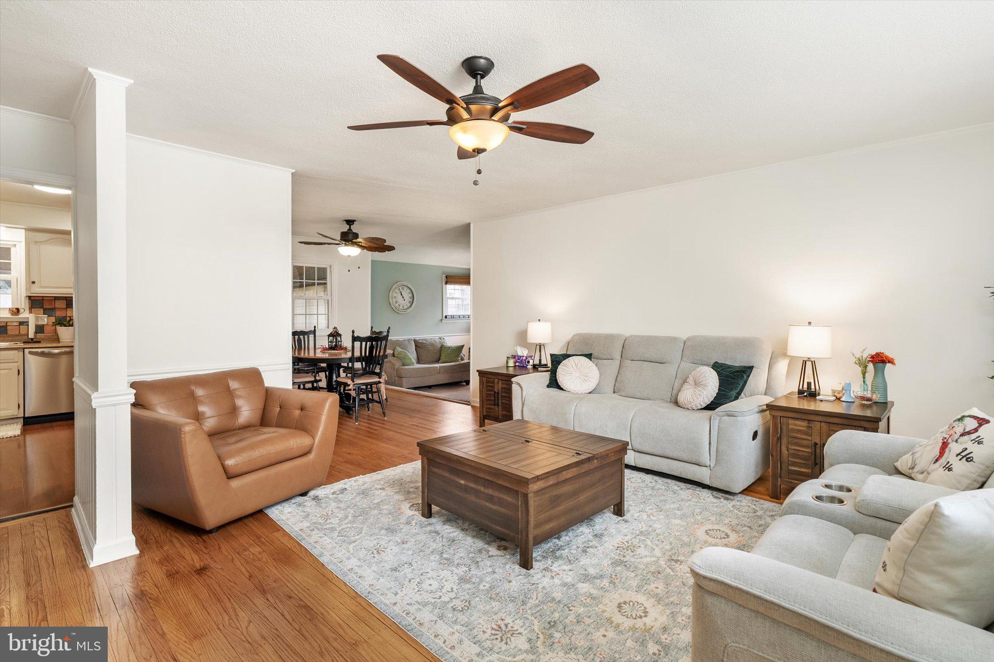 4 Imperial Drive Hamilton, NJ 08690 - Photo 6 of 36 a living room with furniture a ceiling fan and a rug
