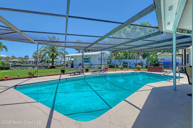 a view of a chairs and table in a patio