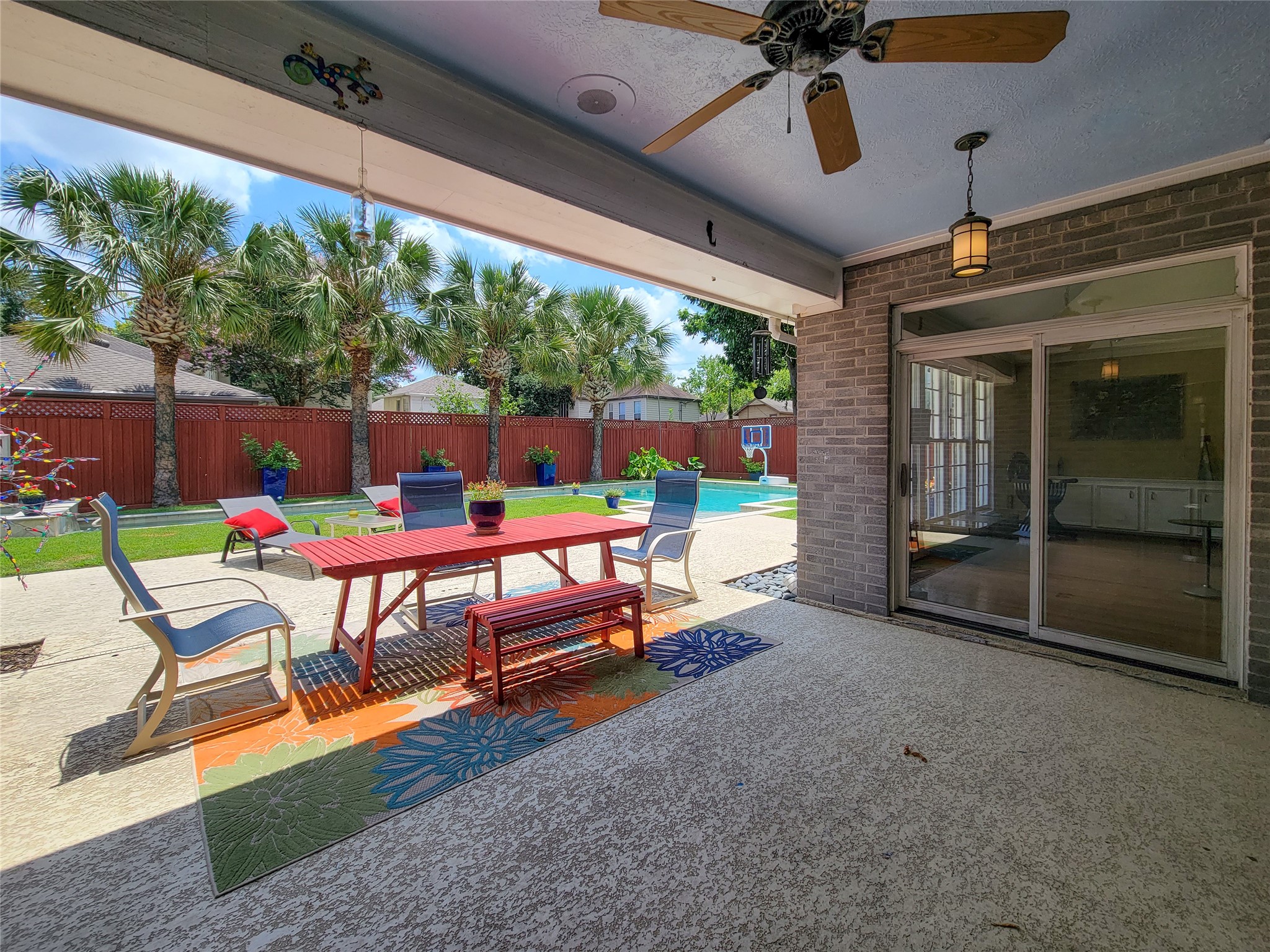 4401 Roseland Street Houston, TX 77006 - Photo 8 of 46 Large Covered Patio overlooking huge yard, spa, lap pool to saline pool!