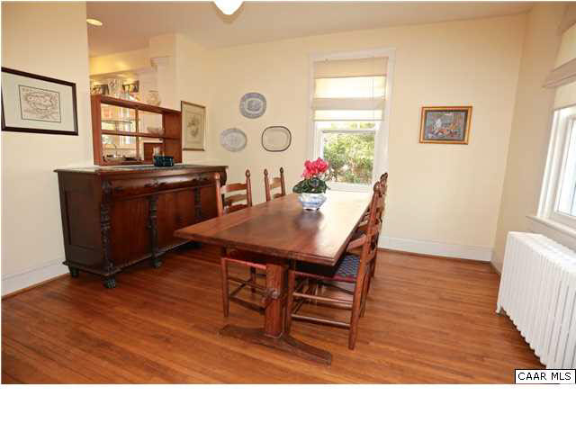 1806 Rugby Place Charlottesville, VA 22903 - Photo 13 of 34 a living room with couches and painting on the wall