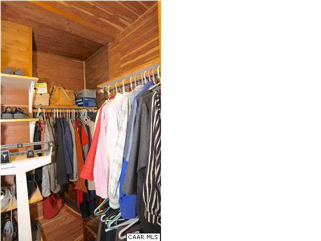 1806 Rugby Place Charlottesville, VA 22903 - Photo 19 of 34 a view of walk in closet with clothes and shoes
