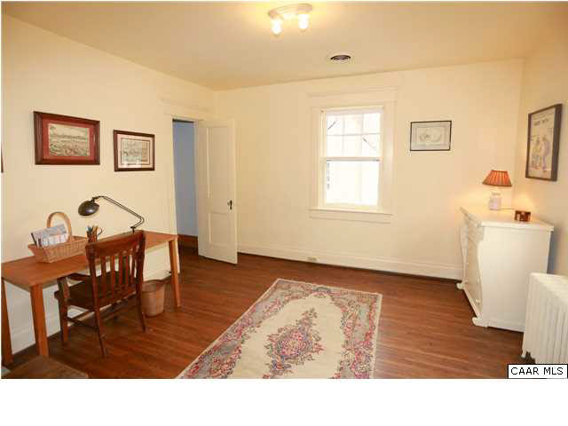1806 Rugby Place Charlottesville, VA 22903 - Photo 22 of 34 a living room with furniture and a window