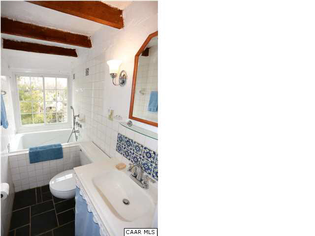 1806 Rugby Place Charlottesville, VA 22903 - Photo 25 of 34 a bathroom with a sink toilet and shower