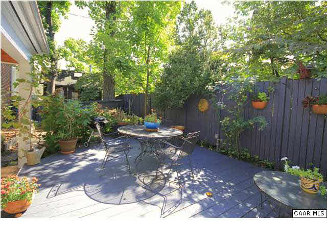 1806 Rugby Place Charlottesville, VA 22903 - Photo 5 of 34 a view of a backyard with plants and trees