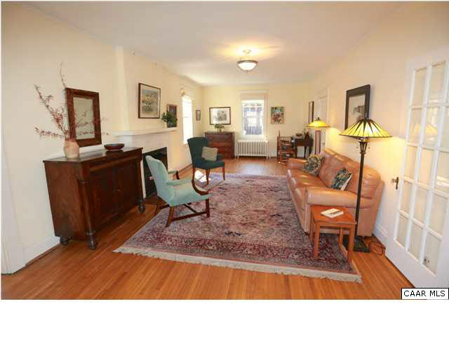 1806 Rugby Place Charlottesville, VA 22903 - Photo 7 of 34 a living room with furniture and a dining table with wooden floor