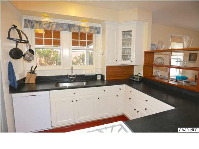 1806 Rugby Place Charlottesville, VA 22903 - Photo 9 of 34 a kitchen with a white cabinets and window