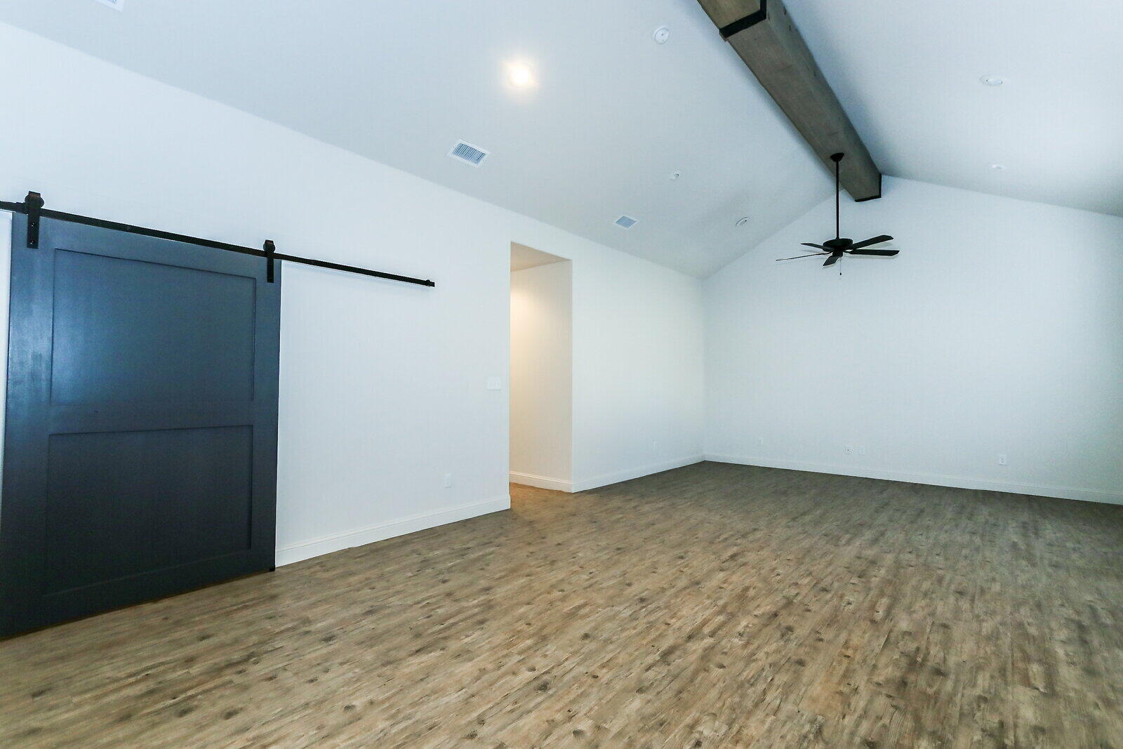 2510 112th Street, Unit A Lubbock, TX 79423 - Photo 21 of 41 a view of a room with wooden floor