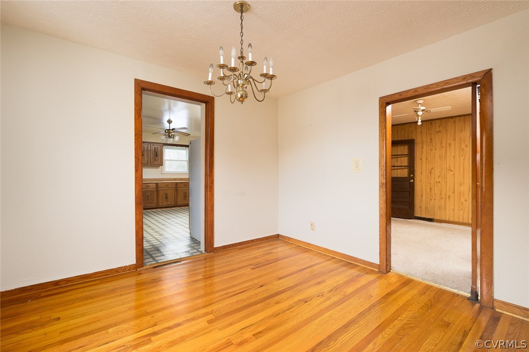 11413 Reedy Branch Road Chesterfield, VA 23838 - Photo 11 of 25 a view of empty room with wooden floor