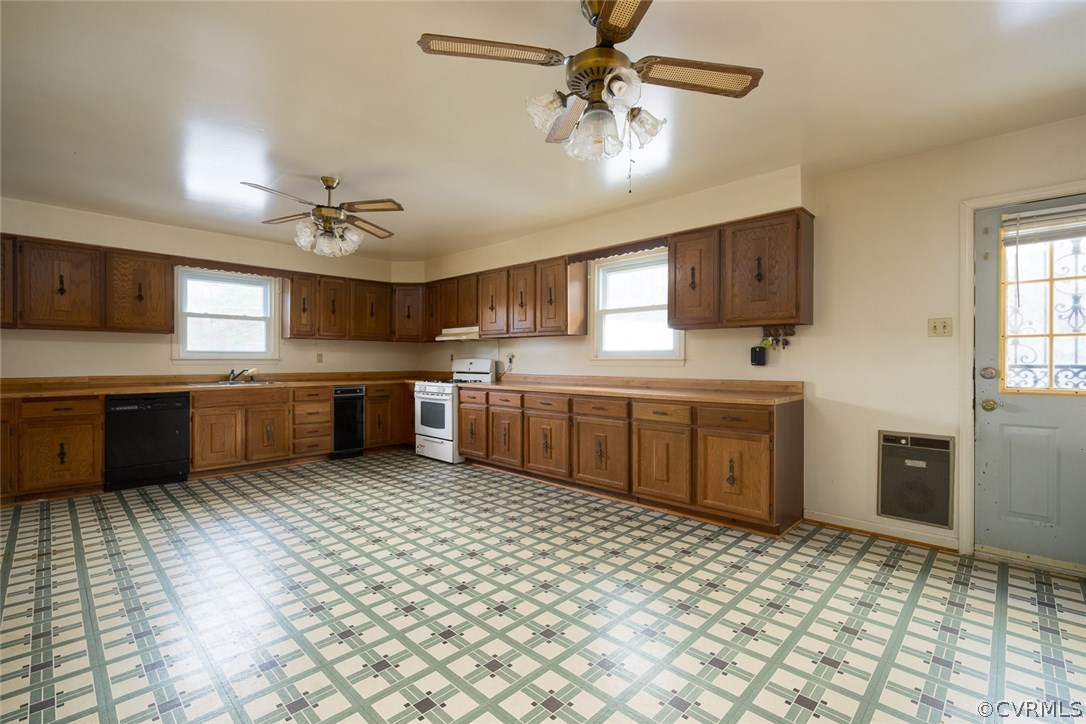 11413 Reedy Branch Road Chesterfield, VA 23838 - Photo 12 of 25 a kitchen with a sink cabinets and window