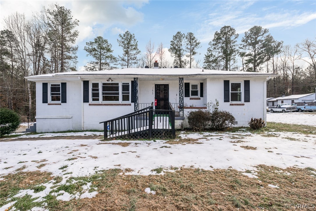 11413 Reedy Branch Road Chesterfield, VA 23838 - Photo 3 of 25 a view of a house with a yard covered in snow