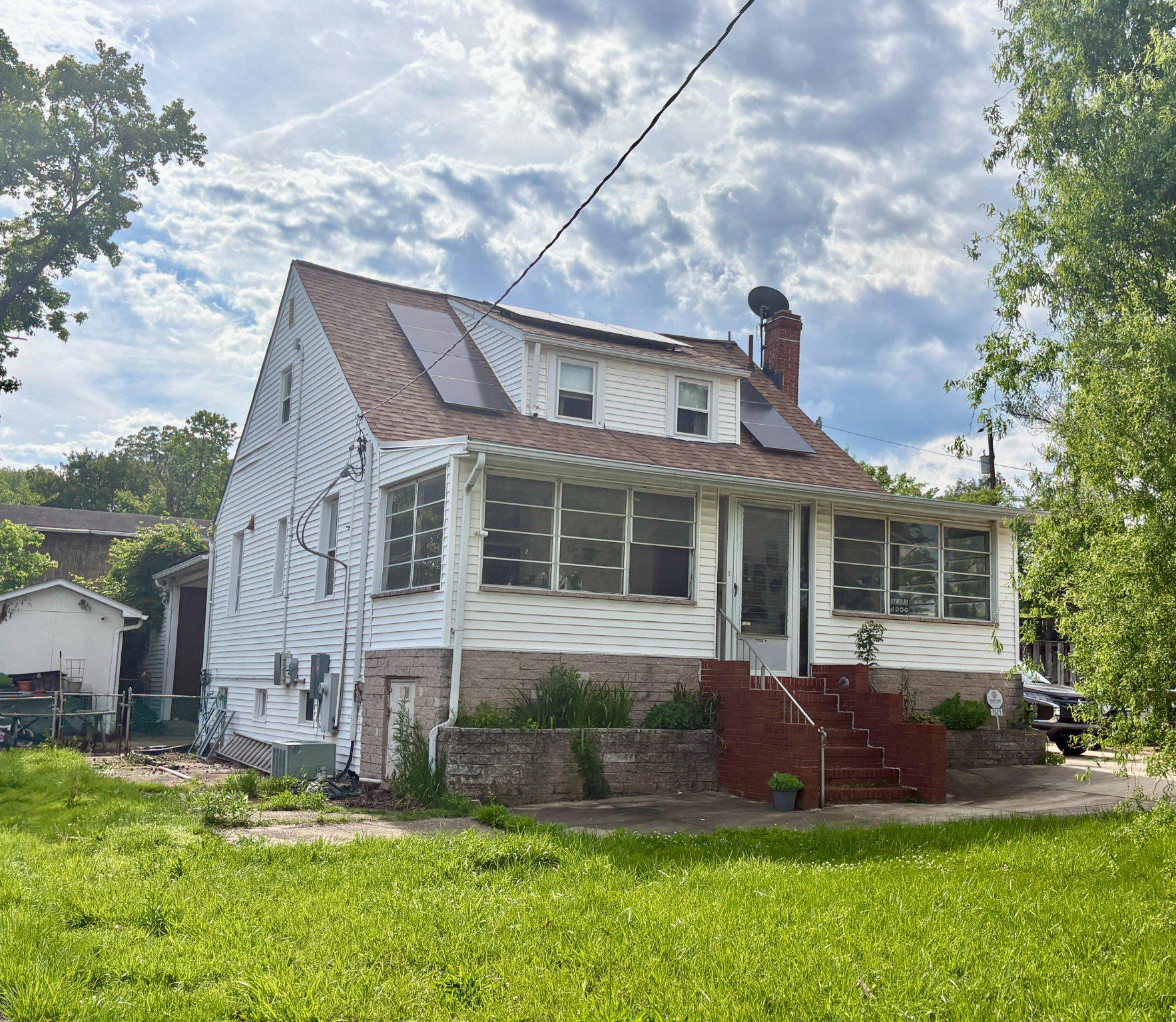 Charming home with inviting porch. New Roof 2023