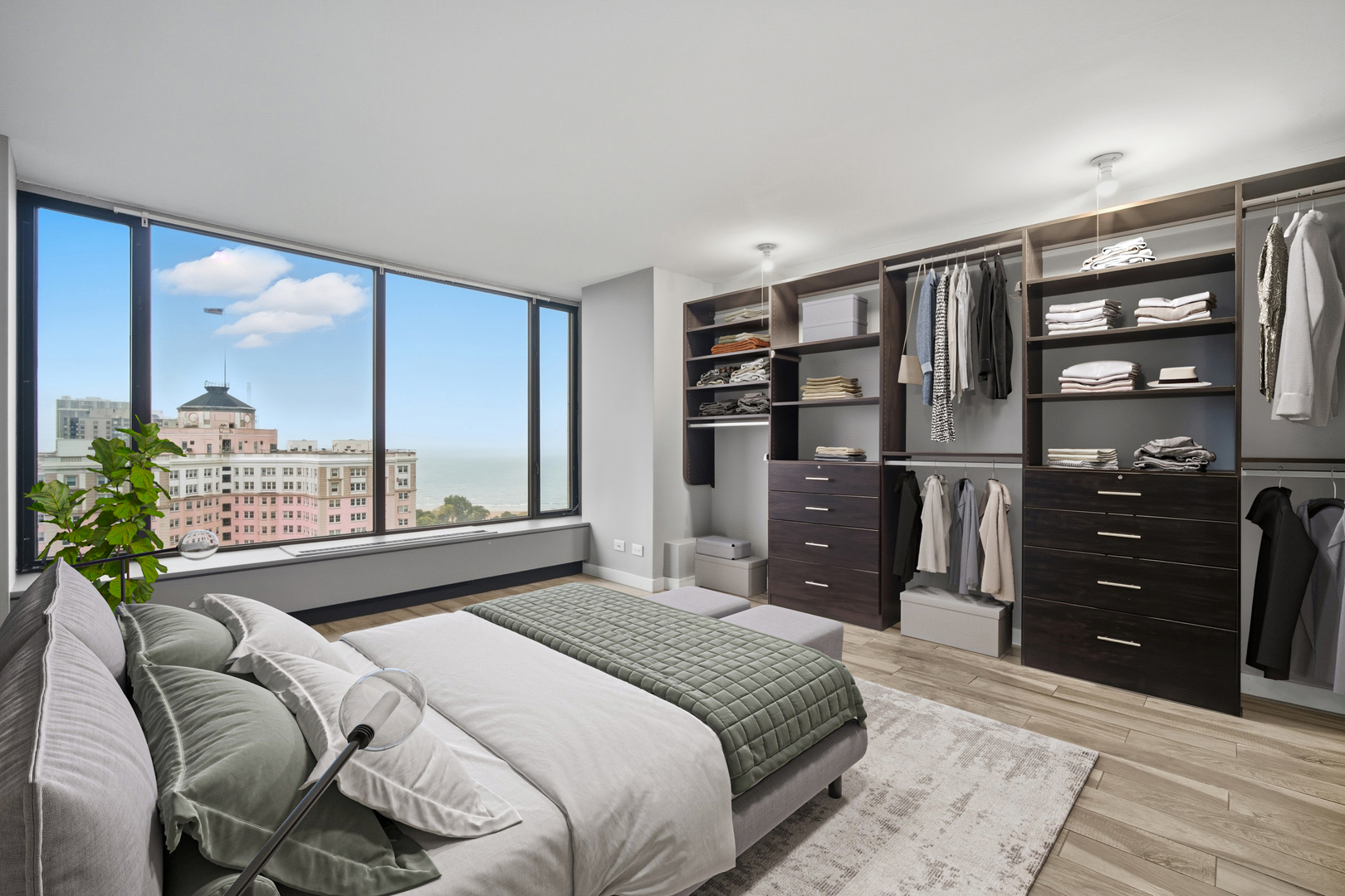 5455 North Sheridan Road, Unit 2611 Chicago, IL 60640 - Photo 20 of 26 a bedroom with a bed window and a flat screen tv