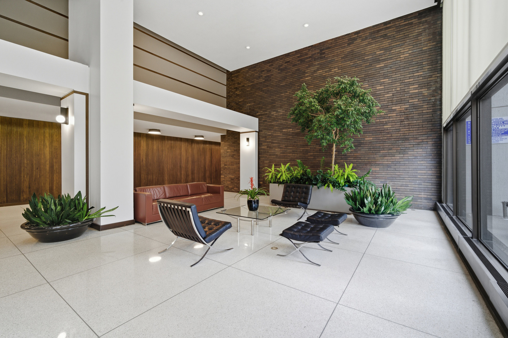 5455 North Sheridan Road, Unit 2611 Chicago, IL 60640 - Photo 3 of 26 a building outdoor space with furniture