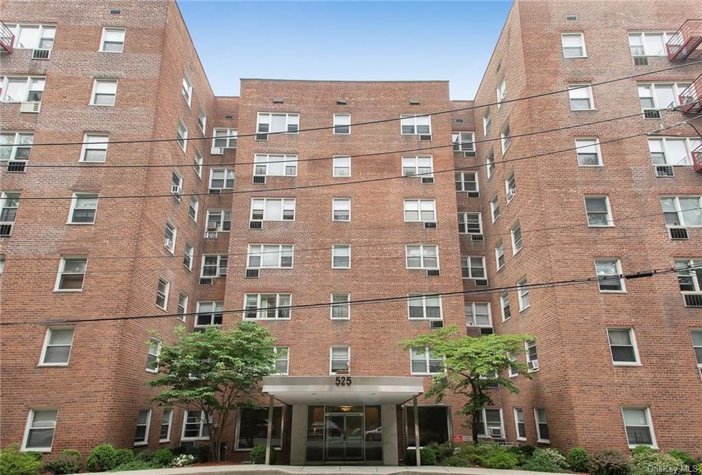 525 Bronxville Road, Unit 5K Bronxville, NY 10708 - Photo 1 of 1 a view of a tall building