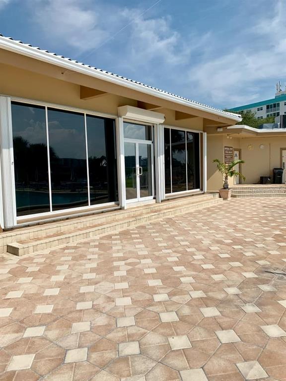 14424 Neptune Road Seminole, FL 33776 - Photo 26 of 32 Community Pool Clubhouse with Fitness Center