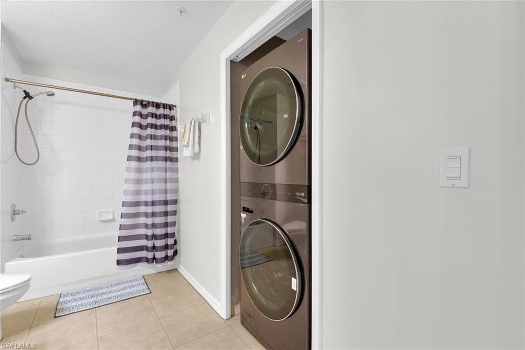 9165 Celeste Drive, Unit 3303 Naples, FL 34113 - Photo 18 of 26 a view of a bathroom with a sink