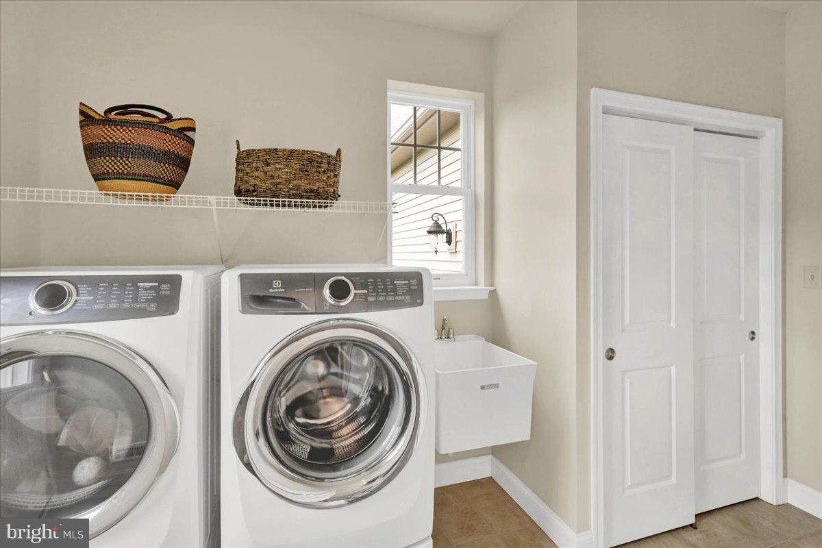 648 Dorset Street Lititz, PA 17543 - Photo 38 of 51 Laundry Room with utility sink and coat closet