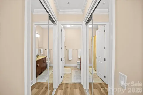 a view of a bathroom with tub and shower