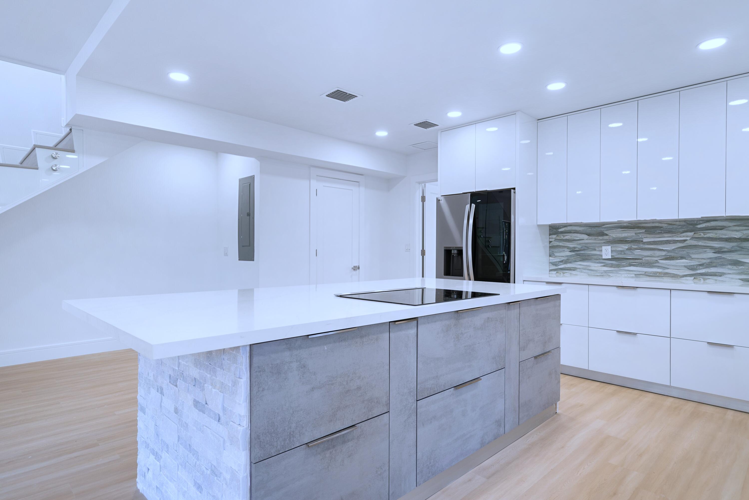 17 Coral Way Key Largo, FL 33037 - Photo 15 of 51 a kitchen with a sink and cabinets