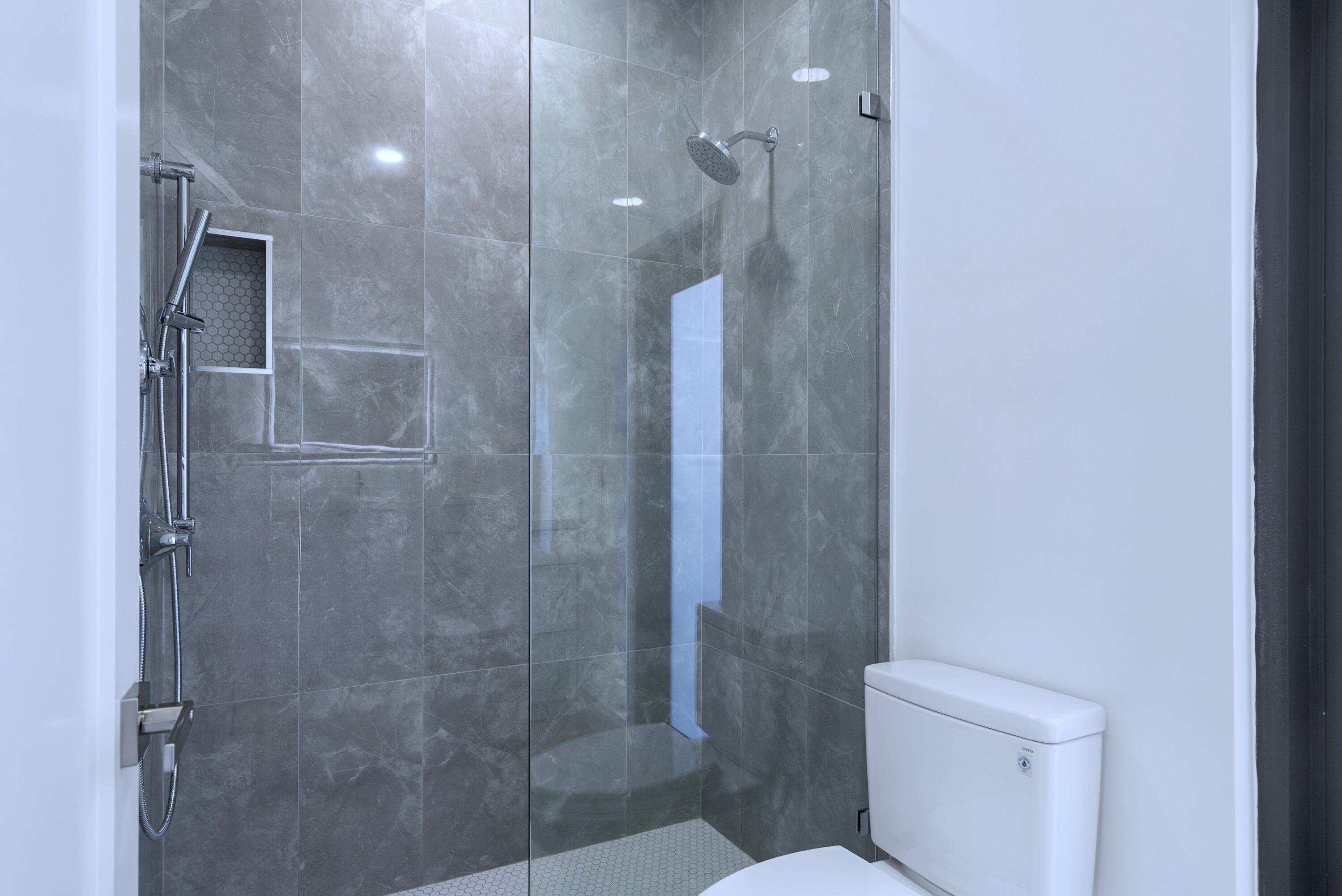 17 Coral Way Key Largo, FL 33037 - Photo 20 of 51 a bathroom with a shower and toilet