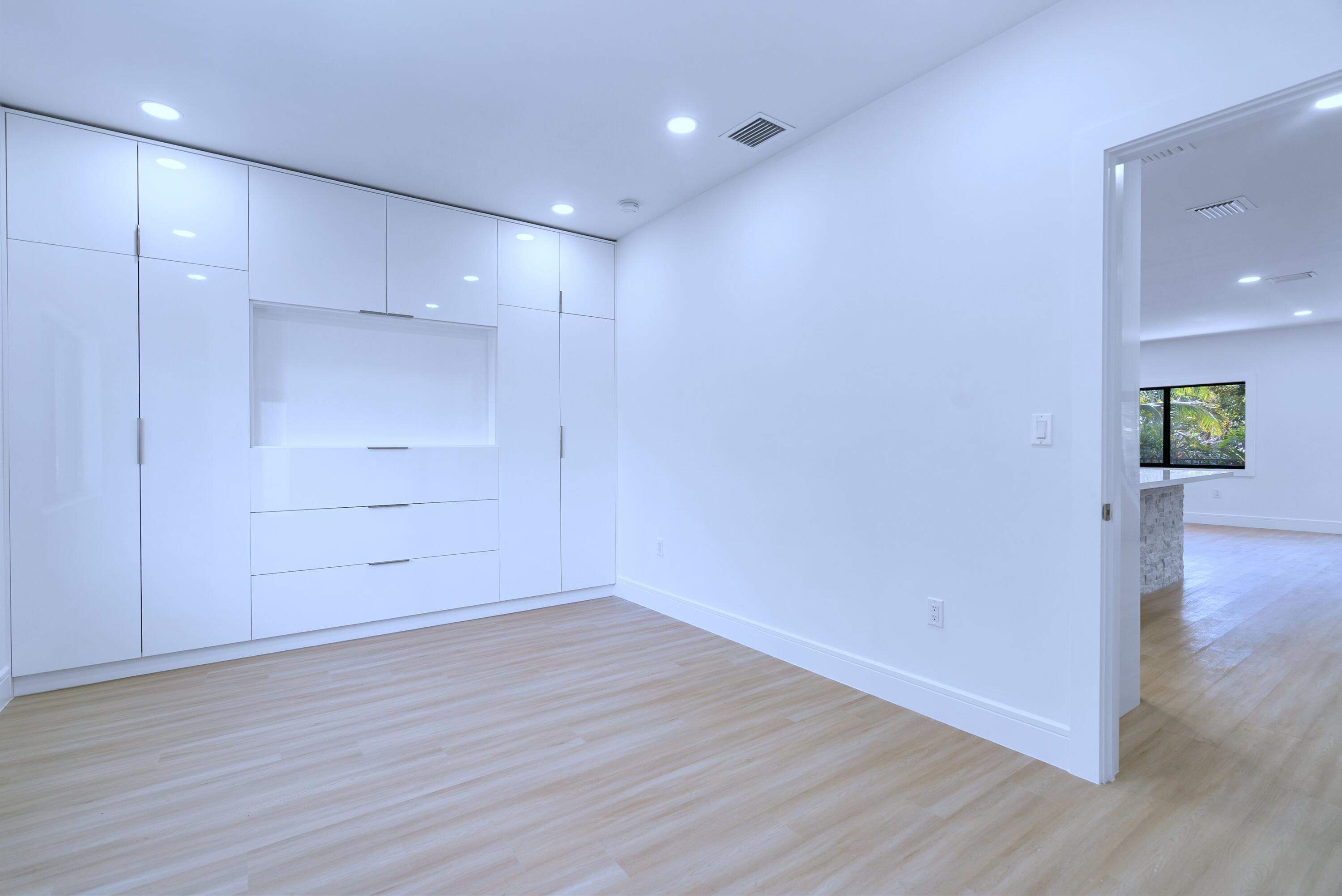 17 Coral Way Key Largo, FL 33037 - Photo 21 of 51 a view of a room with wooden floor