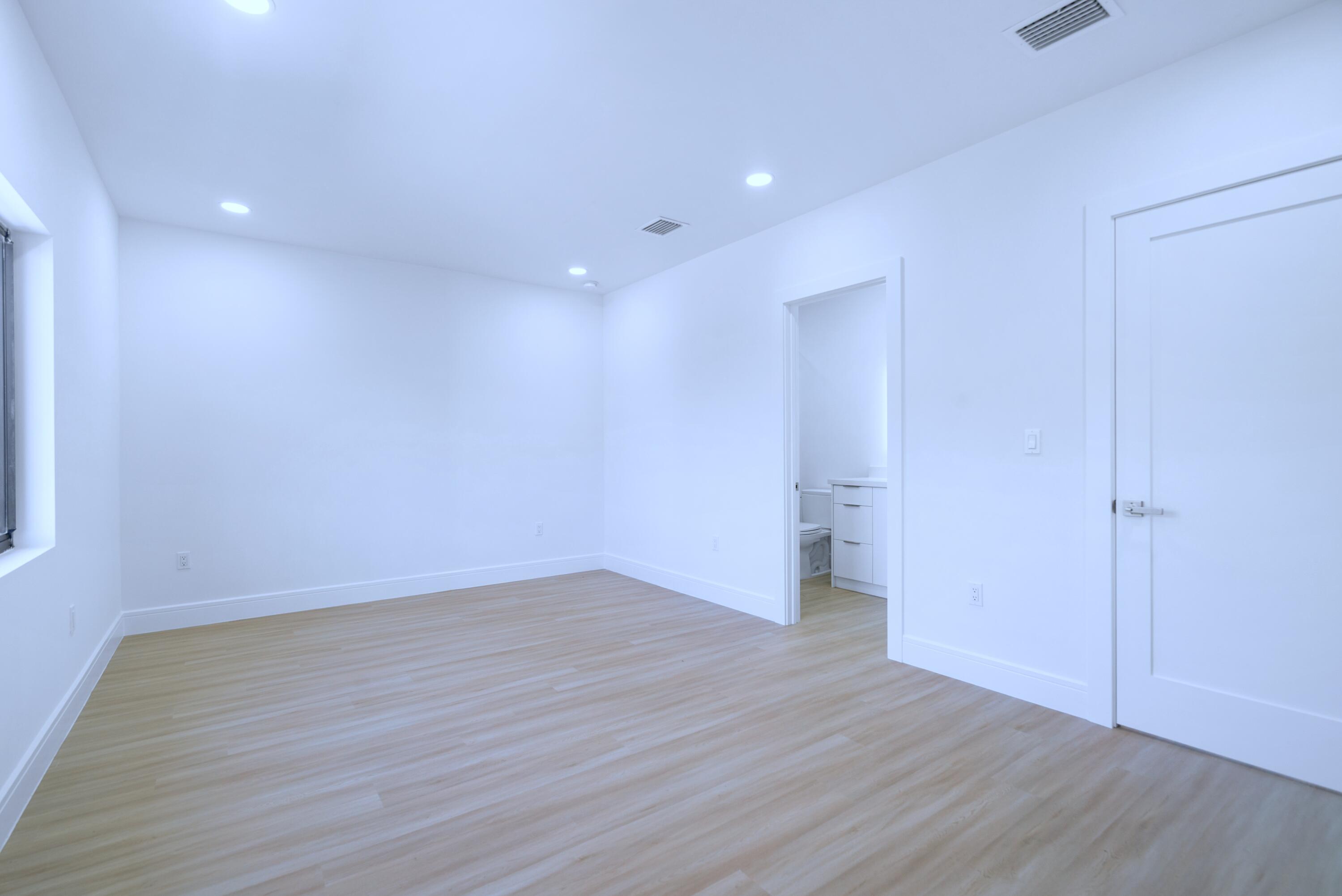 17 Coral Way Key Largo, FL 33037 - Photo 29 of 51 a view of an empty room with wooden floor