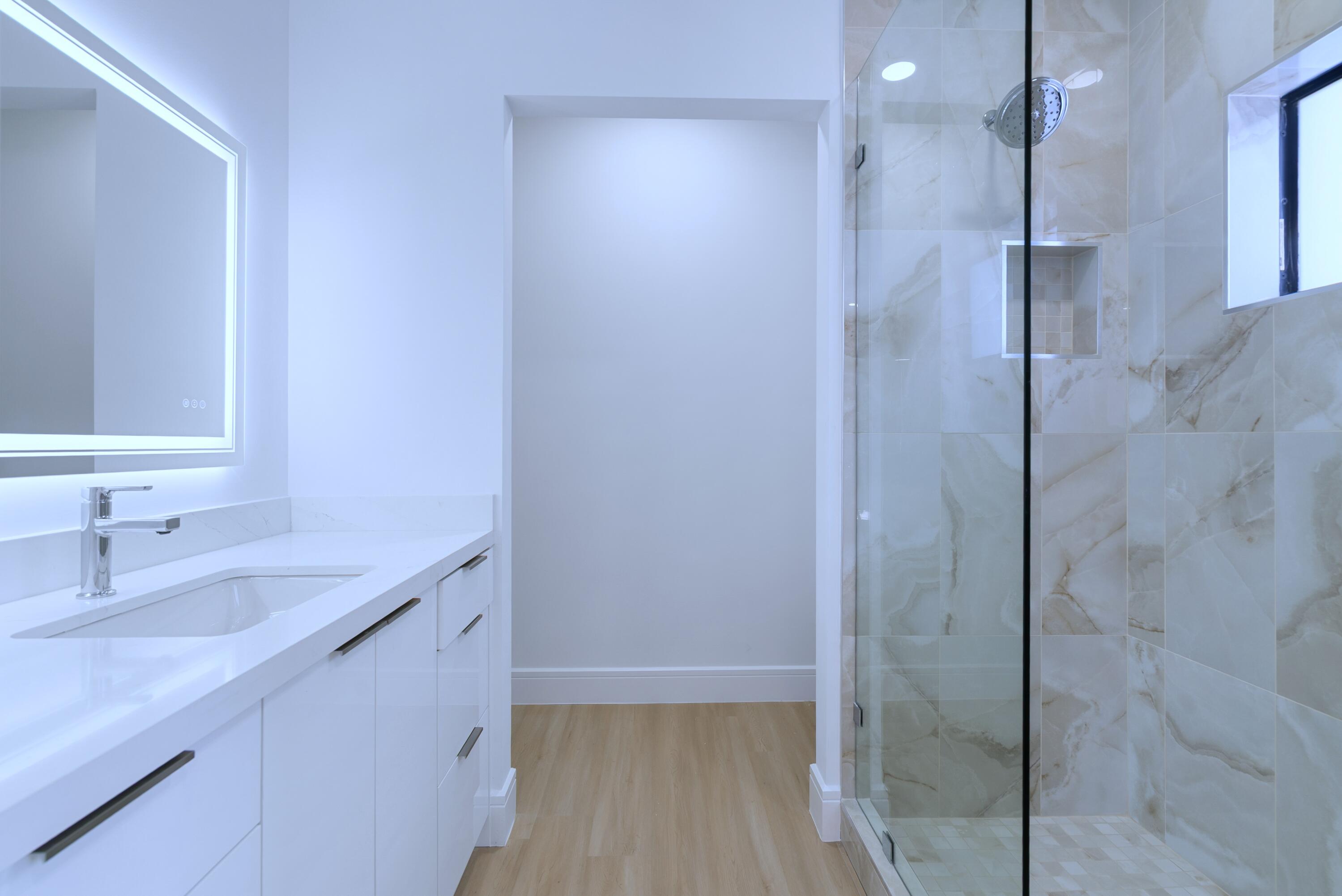 17 Coral Way Key Largo, FL 33037 - Photo 33 of 51 a bathroom with a sink and a mirror