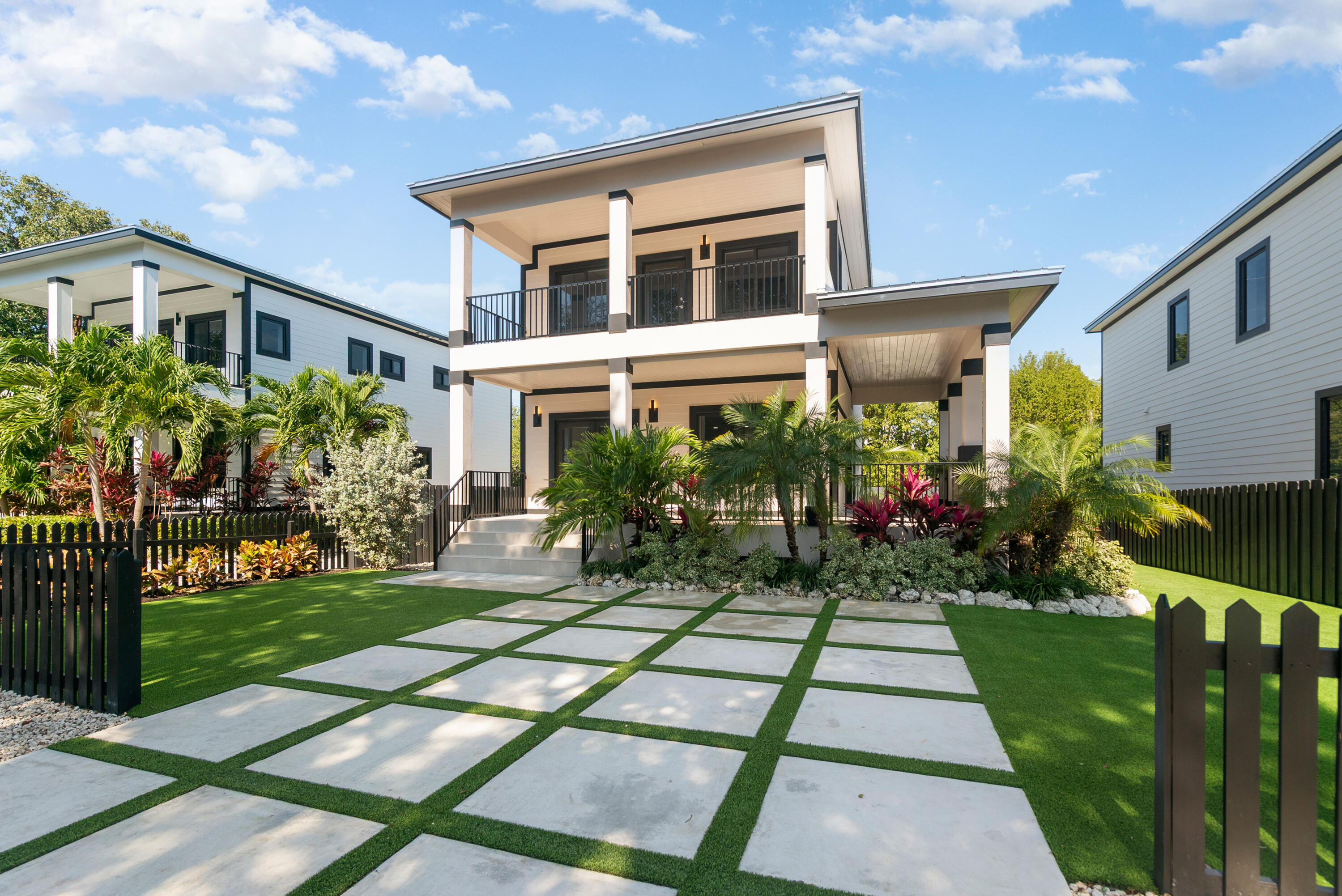 17 Coral Way Key Largo, FL 33037 - Photo 37 of 51 a front view of house and yard with green space