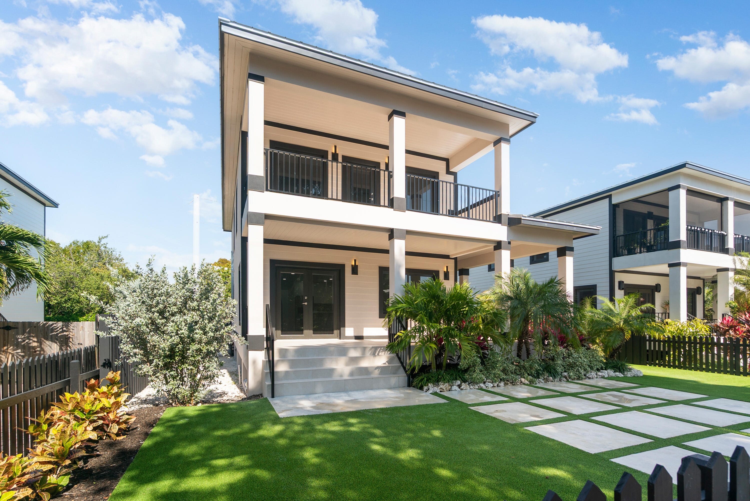 17 Coral Way Key Largo, FL 33037 - Photo 49 of 51 a view of an house with backyard space and garden