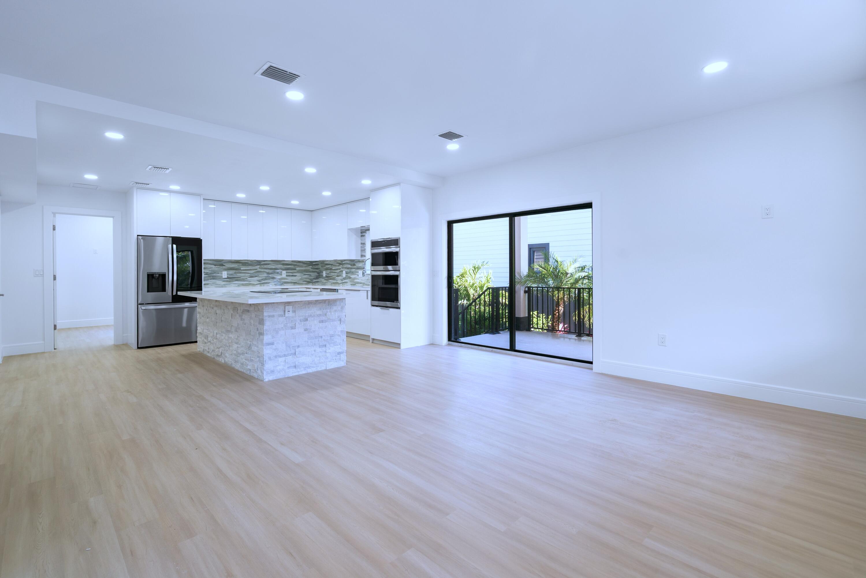 17 Coral Way Key Largo, FL 33037 - Photo 9 of 51 a view of kitchen with stainless steel appliances refrigerator oven and cabinets