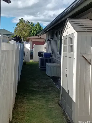 a backyard of a house with seating space