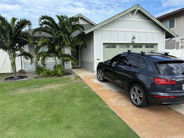 a car parked in front of a house